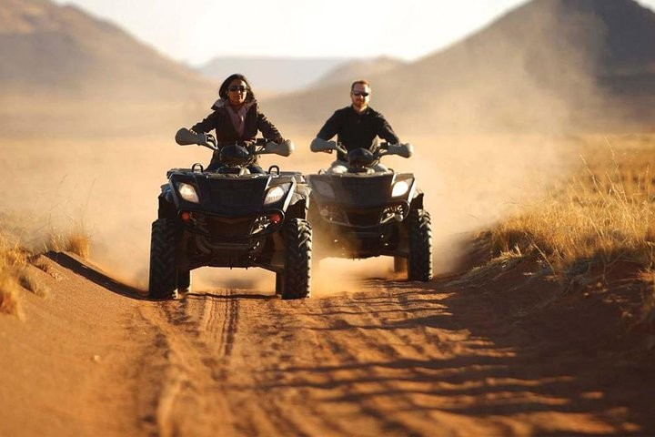 Quad biking around Giza Pyramids desert